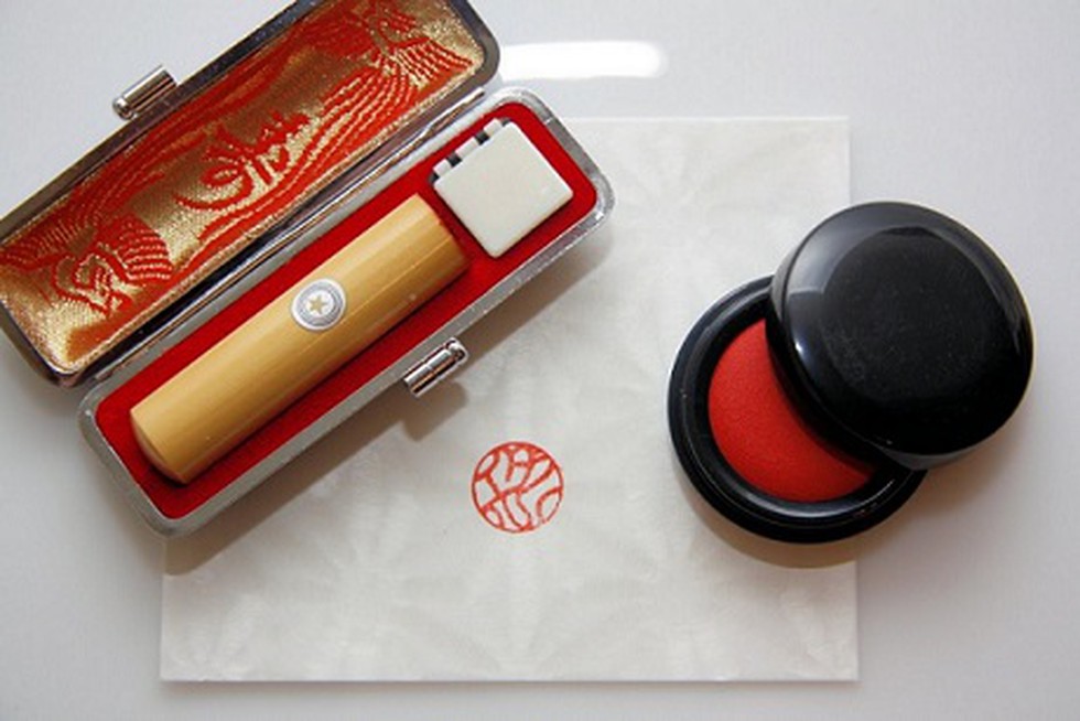 As the number of COVID cases in Japan rise, the hanko tradition is ...